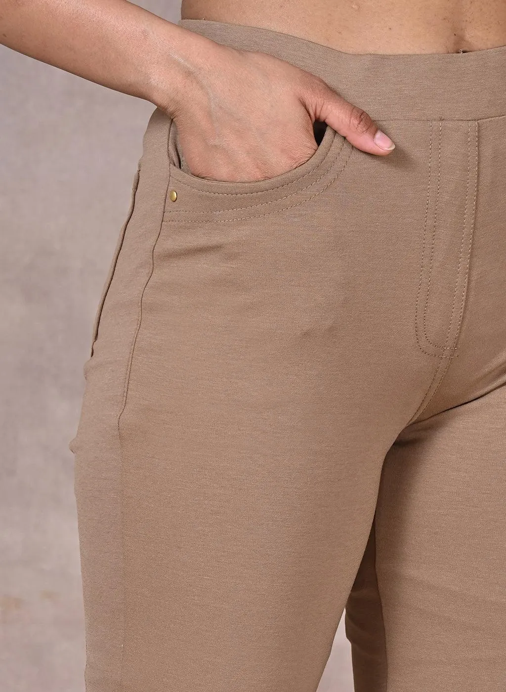 Beige Solid Elastic Jegging with Pocket and Rivets Detailing