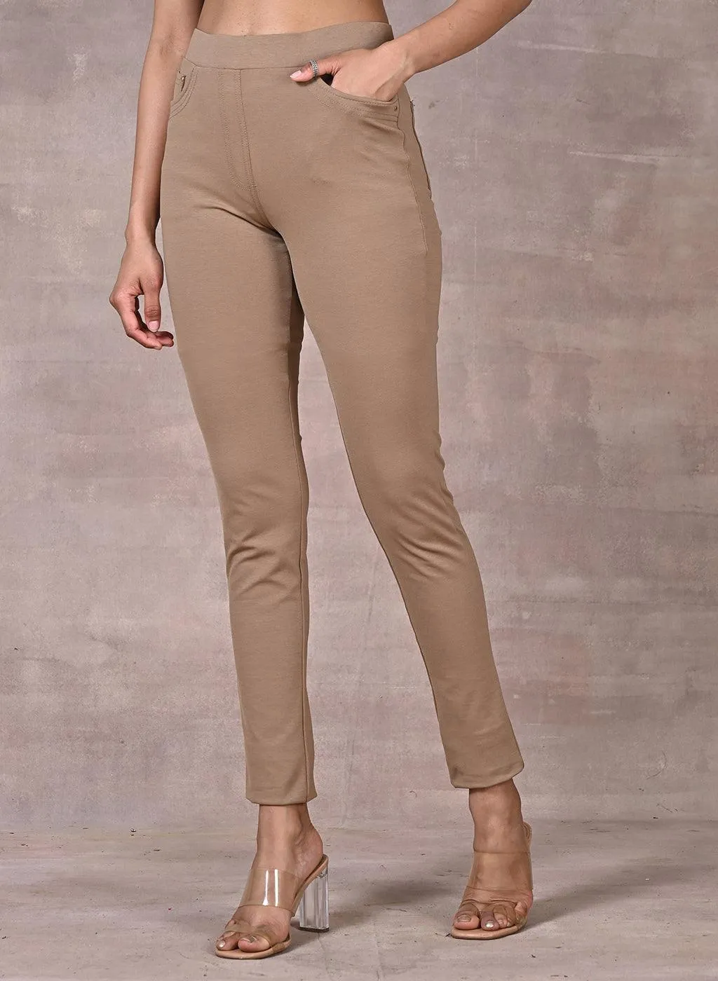 Beige Solid Elastic Jegging with Pocket and Rivets Detailing
