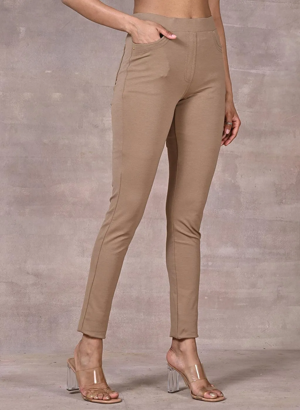 Beige Solid Elastic Jegging with Pocket and Rivets Detailing